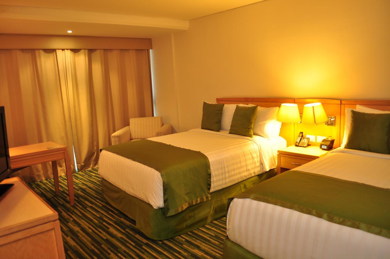 Radisson Paraiso Perisur Mexico Extérieur photo A room at the hotel